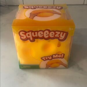 Squeezy Yellow Squeeze Toy - Try Me!